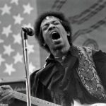 Jimi In Front Of An American Flag