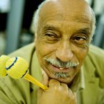 Mulatu_Astatke_Pose_with_drum_sticks_1241451643-1
