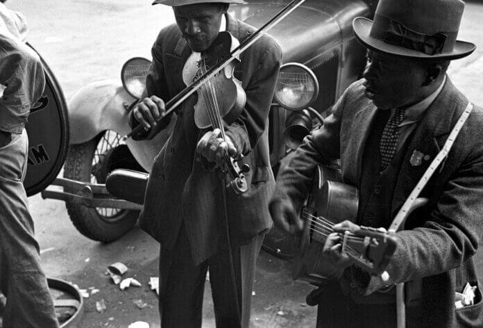 street singer, bluesmen e griot